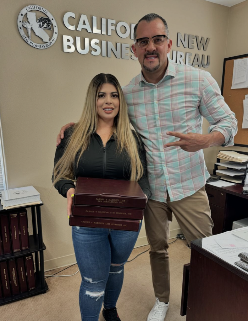 Chris with a client at the CNBB Santa Ana office
